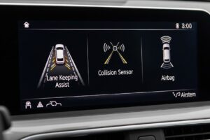 Painel de carro moderno exibindo sistemas de segurança automotiva, simbolizando a proteção veicular. Imagem criada com IA