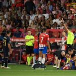 Portu, do Girona, sofreu entrada dura do zagueiro Nacho, do Real Madri (Foto: Josep Lago/AFP)