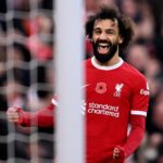 Salah comemorando o primeiro gol do Liverpool