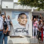 Familiares e amigos em ato pela liberdade do pai de Luis Díaz (Foto: Lismari Machado/AFP)