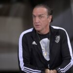 A Justiça não reavaliou o mérito da condenação do técnico Cuca. Foto: Douglas Magno/AFP