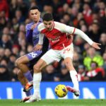 Lance do jogo entre Liverpool e Arsenal no Campeonato Inglês