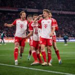 Harry Kane e Joshua Kimmich comemorando gol do Bayern de Munique na Champions League 2023/24