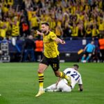 Atacante Niclas Füllkrug comemora gol pelo Borussia Dortmund contra o PSG em 2024