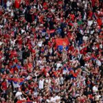 Comportamento de torcida da Sérvia motivou processo da UEFA (Foto: Ina Fassbender/AFP)