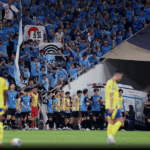 Jogadores do Kawasaki Frontale comemorando a vitória sobre o Al Nassr na Champions Asiática.